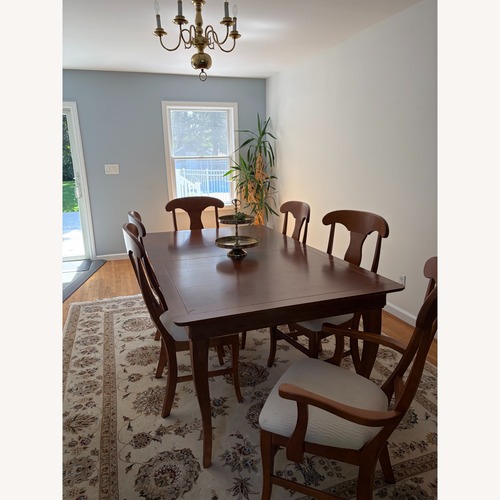 Used The Door Store 7pc Wood Dining Set W Leaf for sale on AptDeco