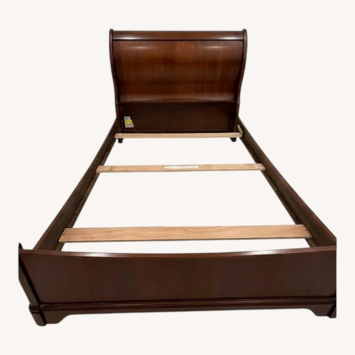 Used Cherry Wood Sleigh Full Size Bedframe for sale on AptDeco