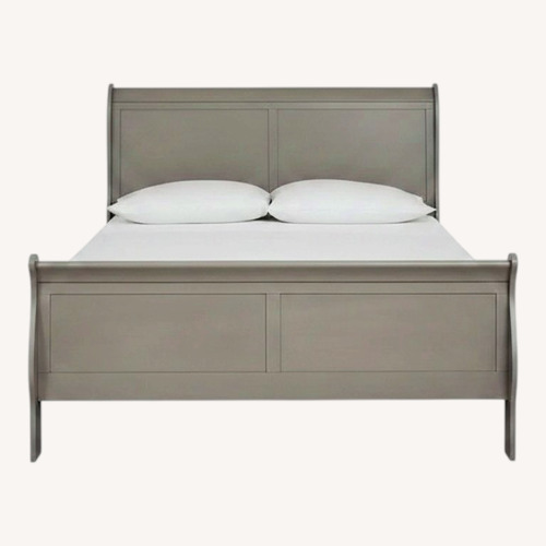 Used Ashley Furniture Light Brown Wood Headboard for sale on AptDeco