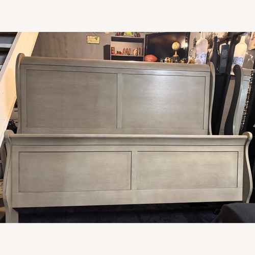 Used Ashley Furniture Light Brown Wood Headboard for sale on AptDeco