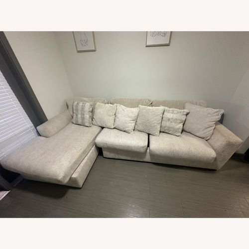 Used Ashley Furniture White Cotton 3+ Piece Sectional for sale on AptDeco