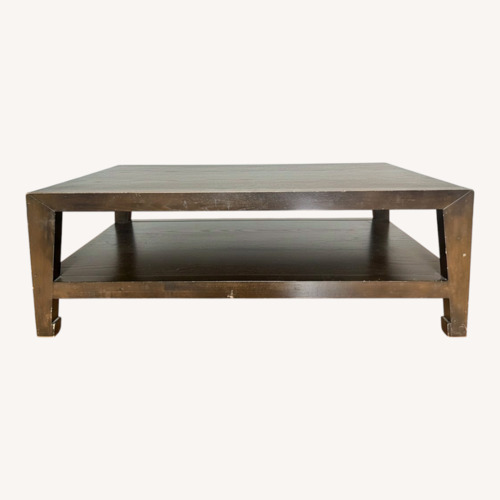 Used Dark Brown Wooden Coffee Table for sale on AptDeco