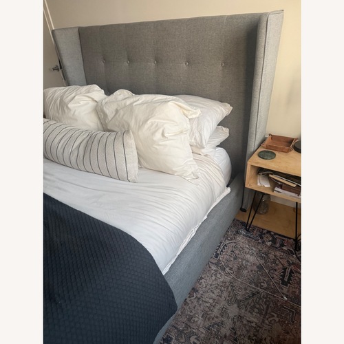 Used Gray Upholstered Queen Bed Frame for sale on AptDeco