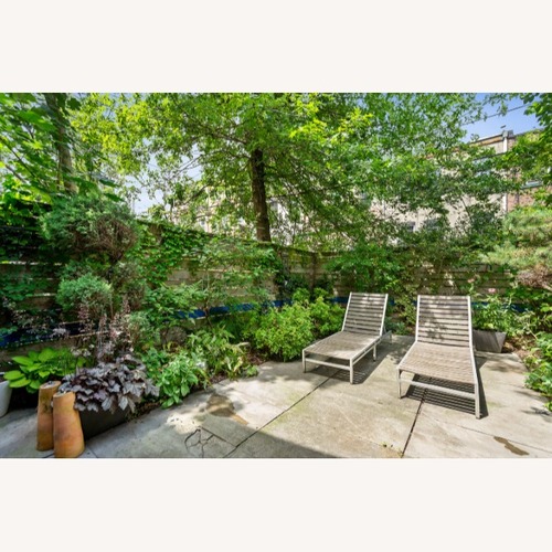 Used Dark Brown Wood Patio Furniture for sale on AptDeco
