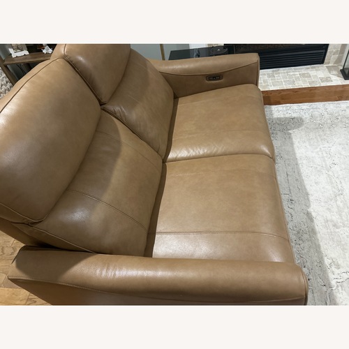 Used Light brown reclining love seat for sale on AptDeco