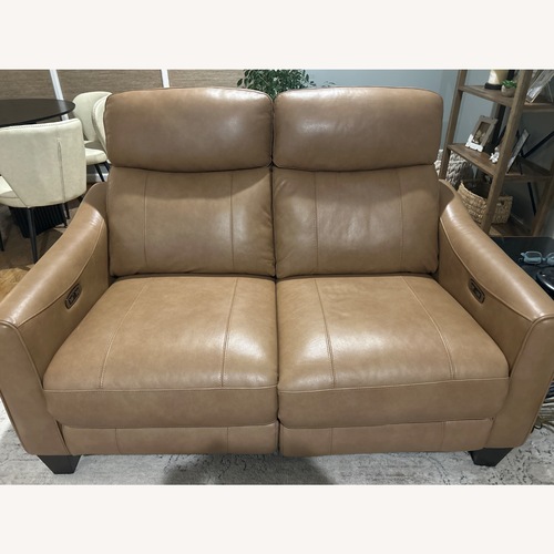 Used Light brown reclining love seat for sale on AptDeco