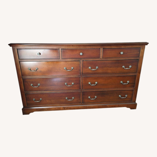 Used Vintage/Antique Finds Dark Brown Wood Dresser for sale on AptDeco