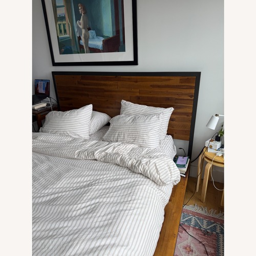 Used West Elm Dark Brown Wood Queen Bed for sale on AptDeco