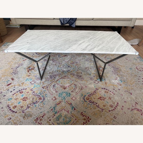 Used West Elm White Marble & Steel Y-Base Coffee Table for sale on AptDeco