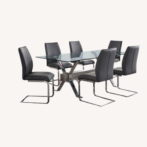 Used Rooms To Go Dark Gray Glass Dining Set for sale on AptDeco