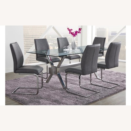 Used Rooms To Go Dark Gray Glass Dining Set for sale on AptDeco