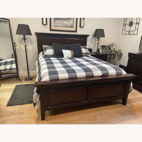 Used Pottery Barn Hudson Dark Brown Wood Queen Bed for sale on AptDeco