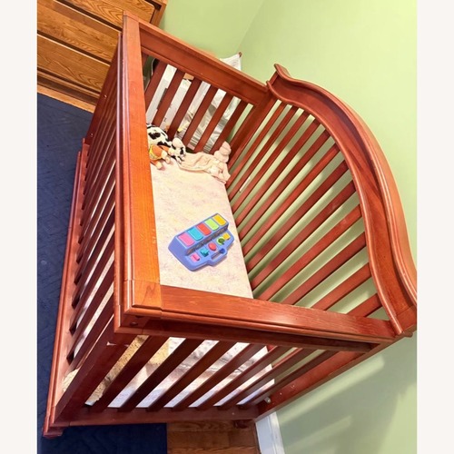 Used Dark Brown Crib for sale on AptDeco