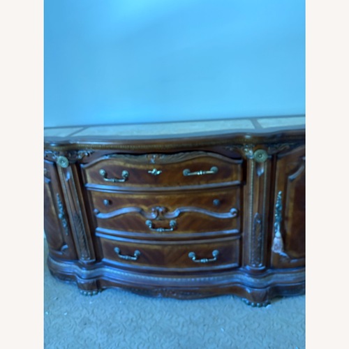 Used Vintage/Antique Finds Dark Brown Wood Dresser for sale on AptDeco