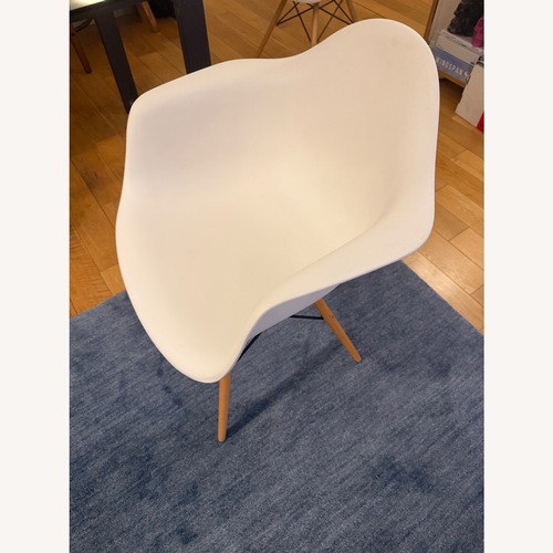 Used Eames Style White Plastic Dining Chair for sale on AptDeco