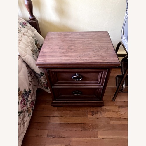 Used Vintage/Antique Dark Brown Wood Nightstand for sale on AptDeco