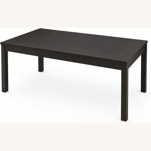 Used IKEA BJURSTA Extendable Dining Table in Brown-Black for sale on AptDeco