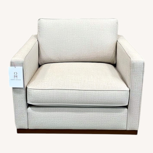 Used Wide Upholstered Armchair W Ottoman for sale on AptDeco