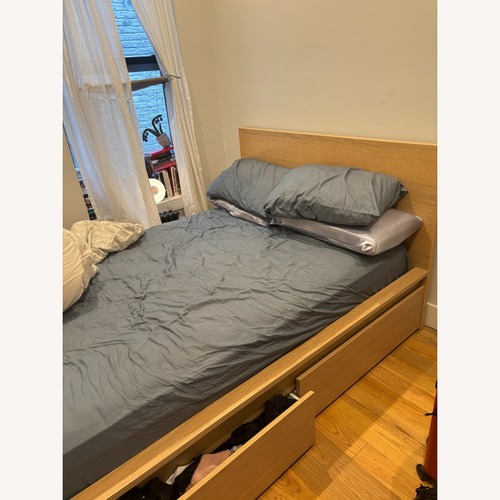 Used IKEA Malm Queen Bed With 2 Storage Drawers for sale on AptDeco