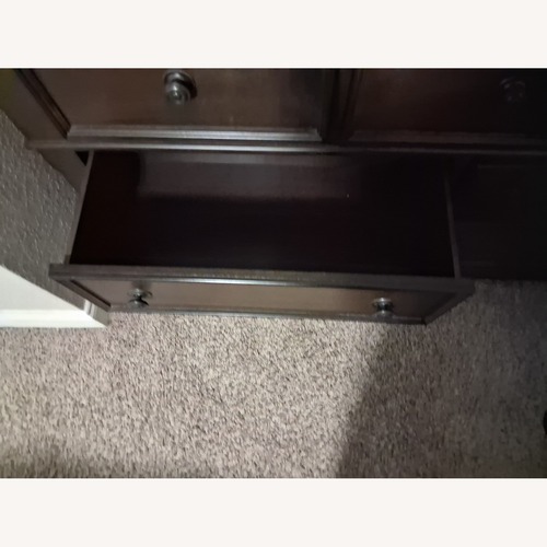 Used Dark Brown Wood Dresser for sale on AptDeco