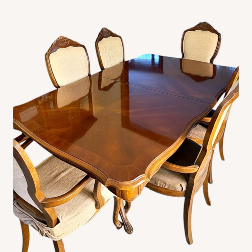 Used 8 piece Polished Wood Extendable Dining Set for sale on AptDeco