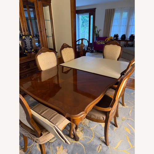 Used 8 piece Polished Wood Extendable Dining Set for sale on AptDeco