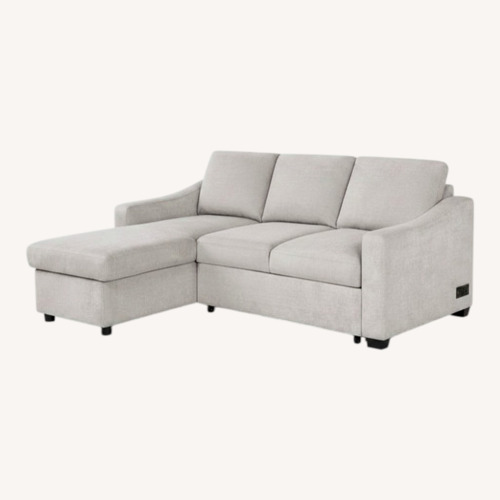Used Costsco Beige Fabric Sleeper Sofa Chaise + Storage for sale on AptDeco