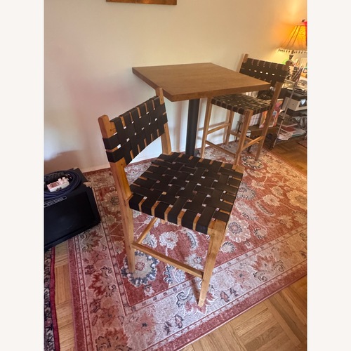 Used From The Source Black Wood Dining Chair for sale on AptDeco