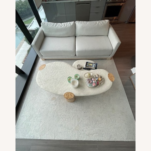Used Sassolino Concrete and Burl Wood 68” Coffee Table for sale on AptDeco