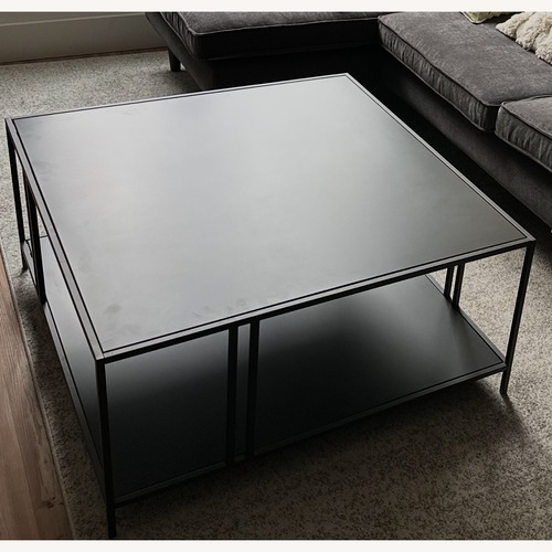 Used West Elm Black Profile Coffee Table (34") for sale on AptDeco