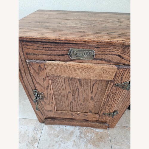 Used Vintage/Antique Dark Brown Wood Nightstand for sale on AptDeco