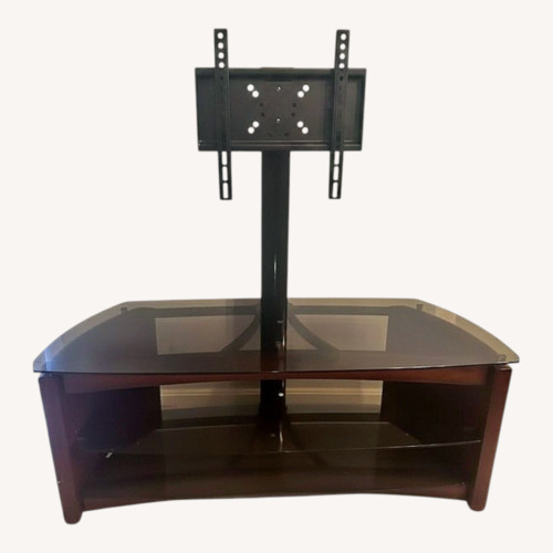Used 48" Wood/Smoked Glass TV Stand w Swivel TV Mount for sale on AptDeco