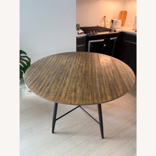 Used Keith Round Metal Base Dining Table for sale on AptDeco