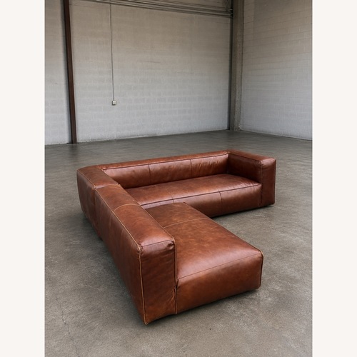 Used Article Cigar Raw Leather 2 Piece Sectional for sale on AptDeco