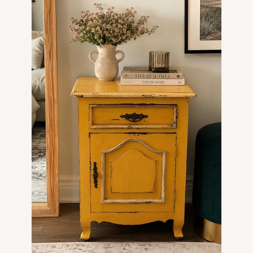 Used Vintage Distressed Mustard Yellow Side Table for sale on AptDeco