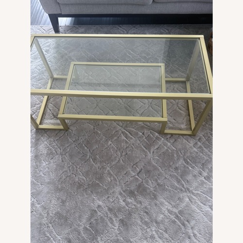 Used Gold Glass Coffee Table for sale on AptDeco