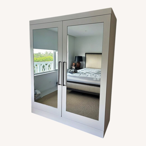 Used White Mirrored Wardrobe with 16 Pull-Out Drawers for sale on AptDeco