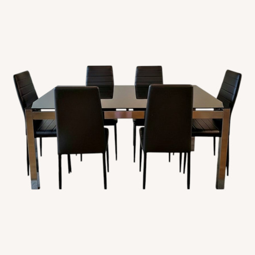 Used Ashley Furniture Black Glass Dining Table and Chair for sale on AptDeco