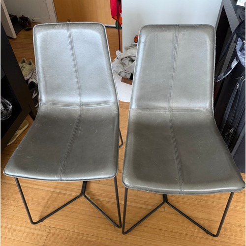 Used West Elm Gray Slope Leather Dining Chairs Set of 2 for sale on AptDeco