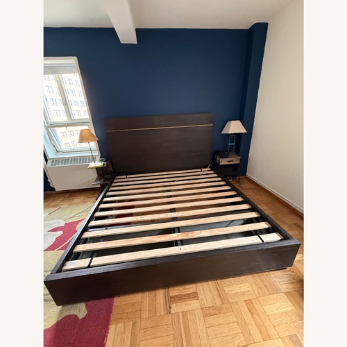 Used Macy's Dark Brown Wood King Bed for sale on AptDeco