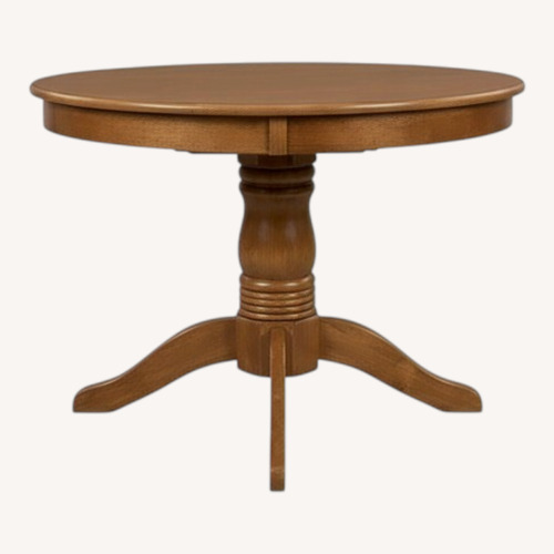 Used Round Solid Wood Oak Dining Table  for sale on AptDeco
