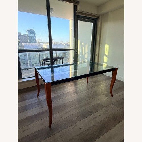 Used Modern rectangular glass-top table for sale on AptDeco