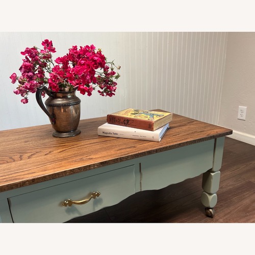 Used Country Cottage Oak Coffee Table on Brass Casters for sale on AptDeco