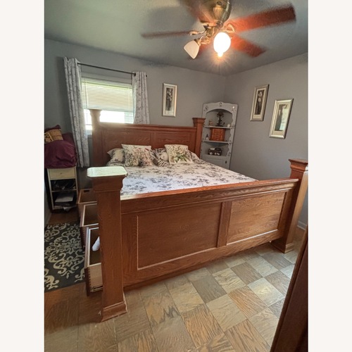 Used Solid Oak 4 Poster King Bed with 6 Drawer for sale on AptDeco