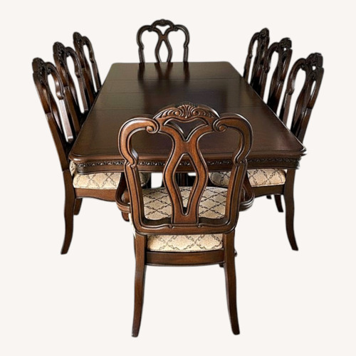Used Dark Brown Wood Dining Set for sale on AptDeco