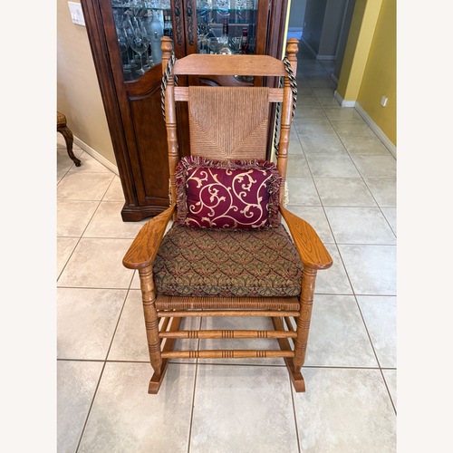 Used Dark Brown Wood Accent Chair for sale on AptDeco