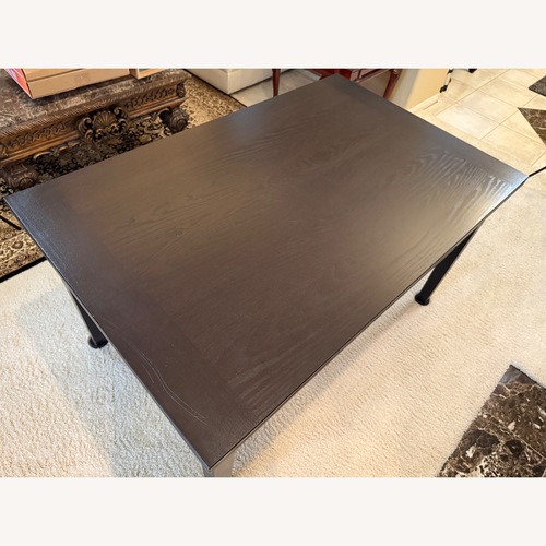 Used Dark Brown Dining Table for sale on AptDeco