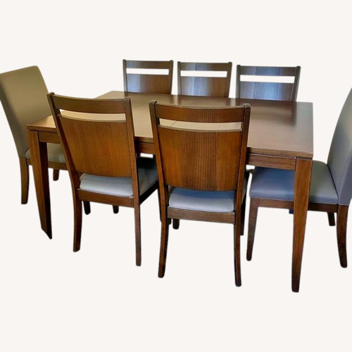 Used Dark Brown Wood Dining Set for sale on AptDeco
