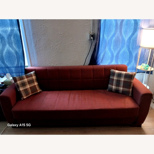 Used Red Fabric Sleeper Sofa for sale on AptDeco