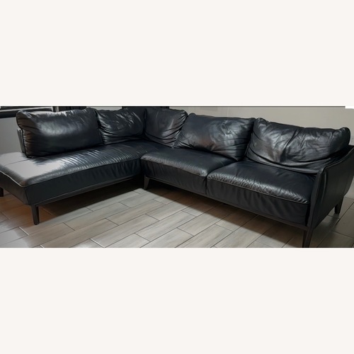 Used Calvin Klein Dark Blue Leather Sectional for sale on AptDeco